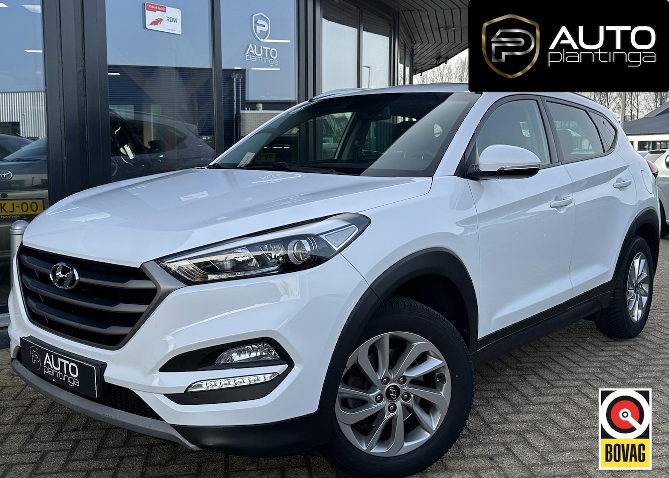Hyundai Tucson - 1.6 GDi Comfort | Zeer Nette Staat | Achteruitrijcamera | Navigatie | Climate Control | Cr - AutoWereld.nl