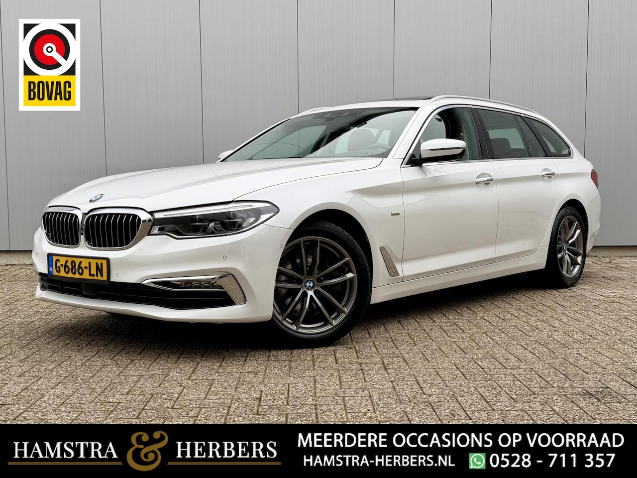 BMW 5-serie Touring - 540i xDrive High Executive wit - AutoWereld.nl