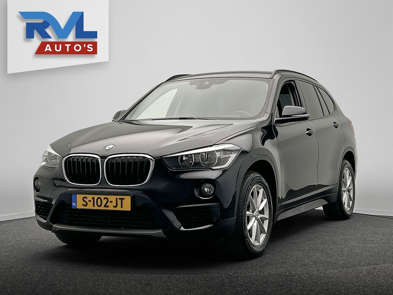 BMW X1 - SDrive18i Centennial High Executive | Trekhaak | Leder Navigatie Memorie Stoelverwarming C - AutoWereld.nl
