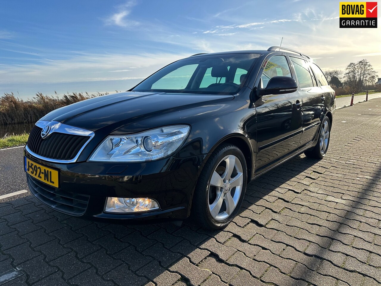 Skoda Octavia Combi - 1.8 TSI Ambition 1.8 TSI Ambition, PDC, Trekhaak, Cruisecontrol, Climatcontrol, Stoelverwarming - AutoWereld.nl