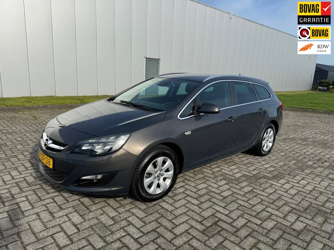 Opel Astra Sports Tourer - 1.6 CDTI Business 1.6 CDTi Business + , Climaat control ,Navigatie, Trekhaak - AutoWereld.nl