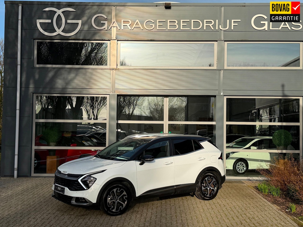 Kia Sportage - 1.6 T-GDi hev Hybrid DynamicLine two tone - AutoWereld.nl