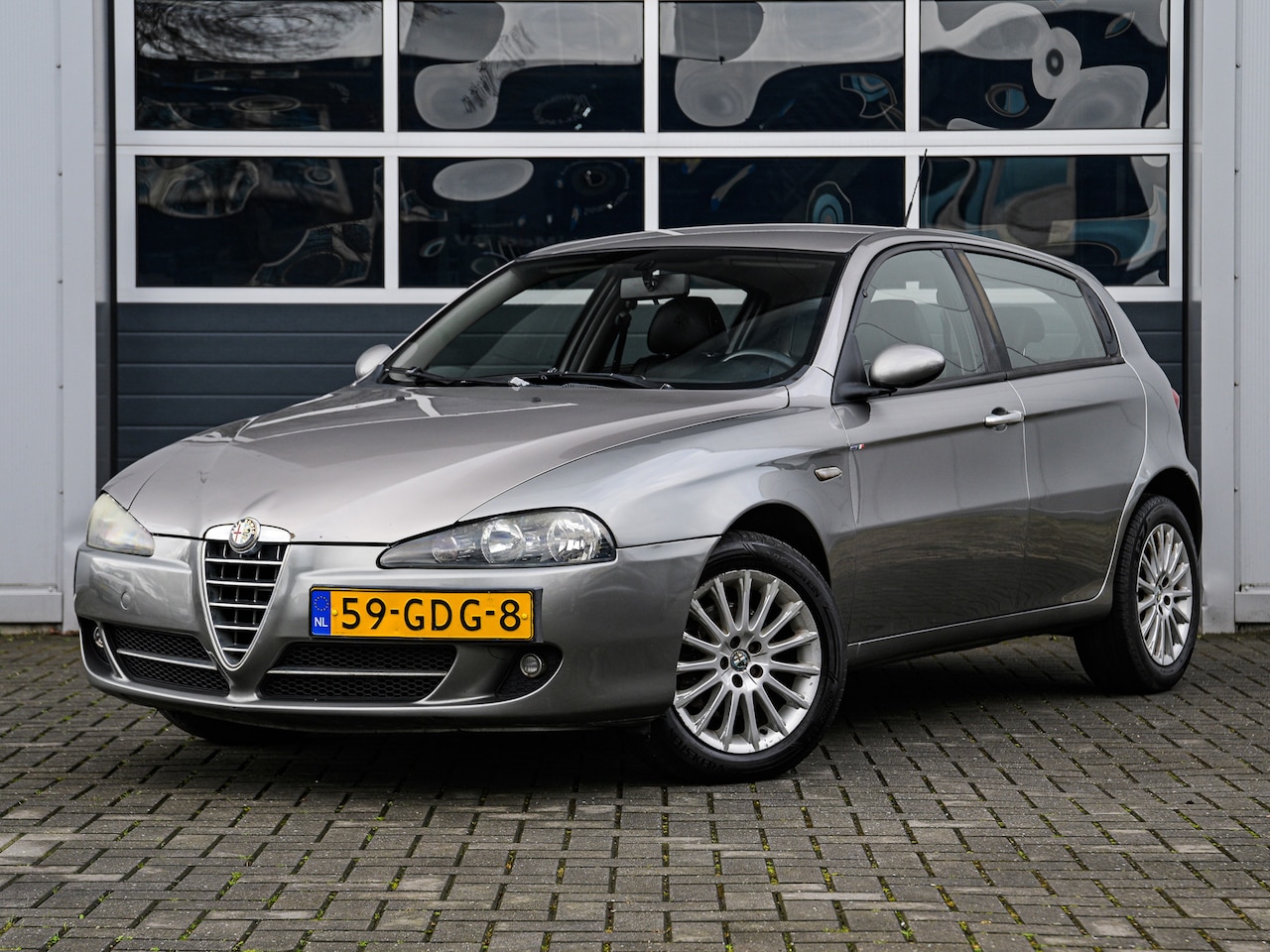 Alfa Romeo 147 - 1.6 T.Spark Progression | Leder | Climate control | Cruise control - AutoWereld.nl