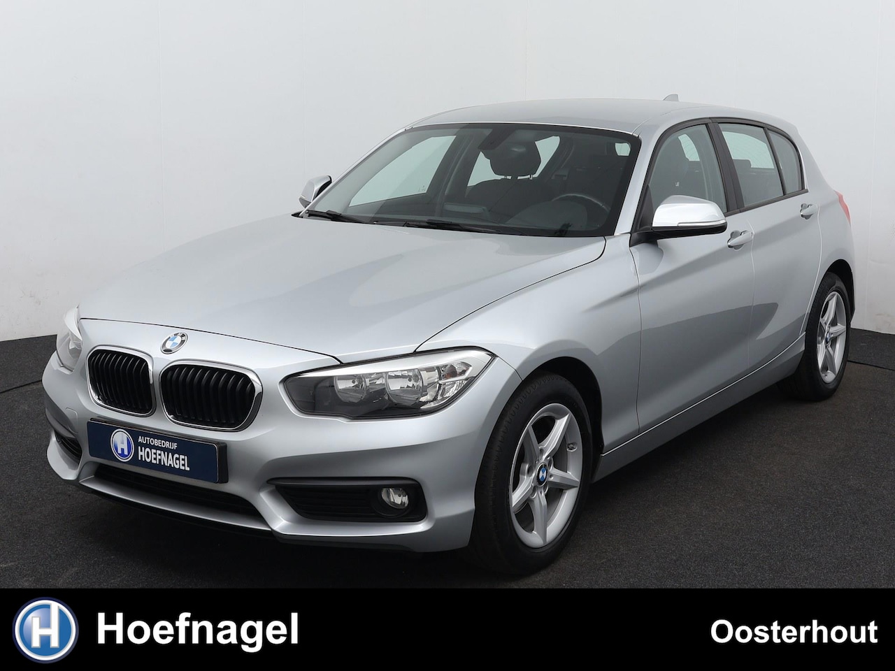 BMW 1-serie - 118i | Stoelverwarming | Cruise Control | Parkeersensoren | Navigatie - AutoWereld.nl