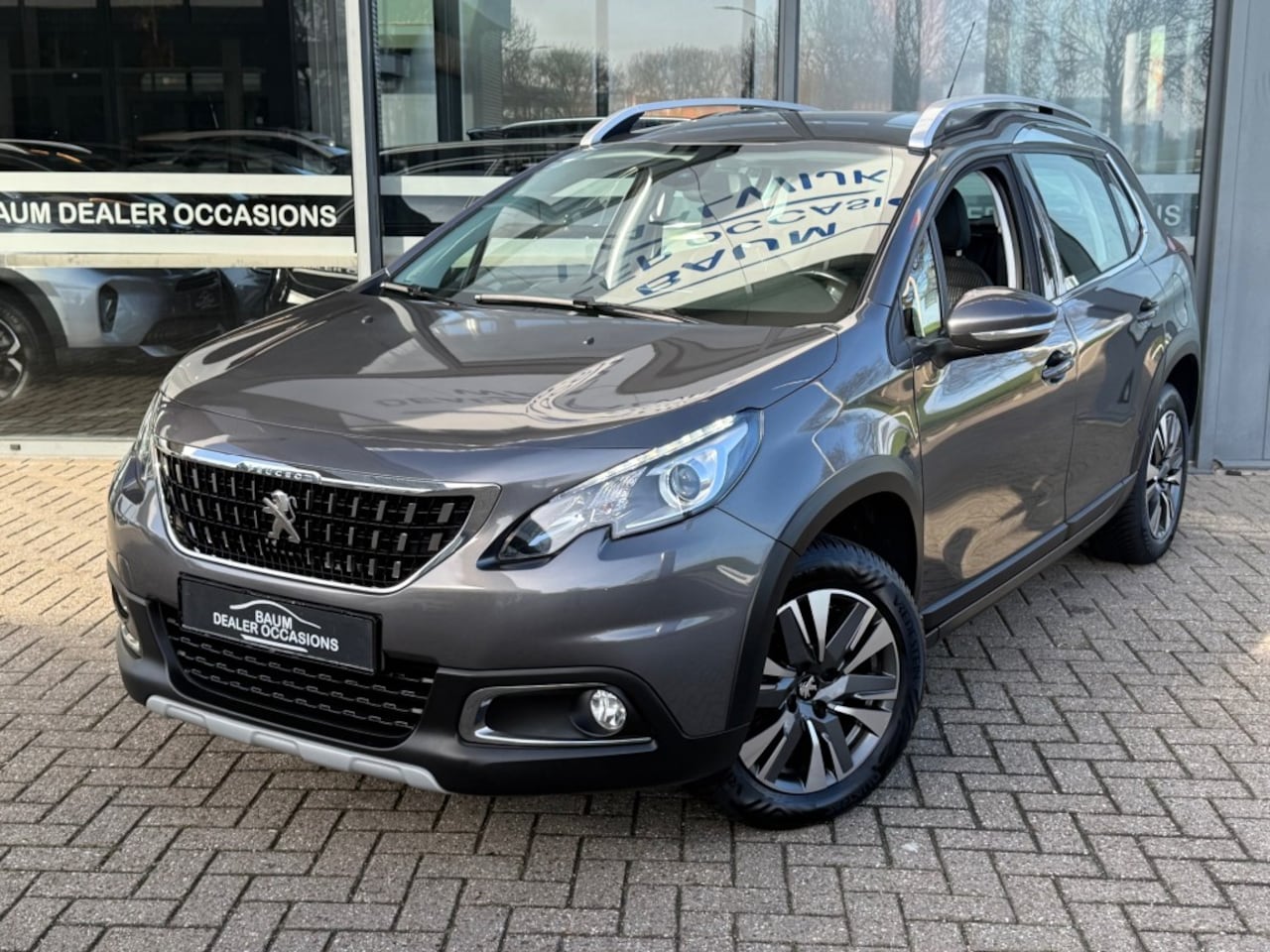 Peugeot 2008 - 1.2 PURETECH ALLURE AIRCO NAVI LMV PDC LMV. - AutoWereld.nl