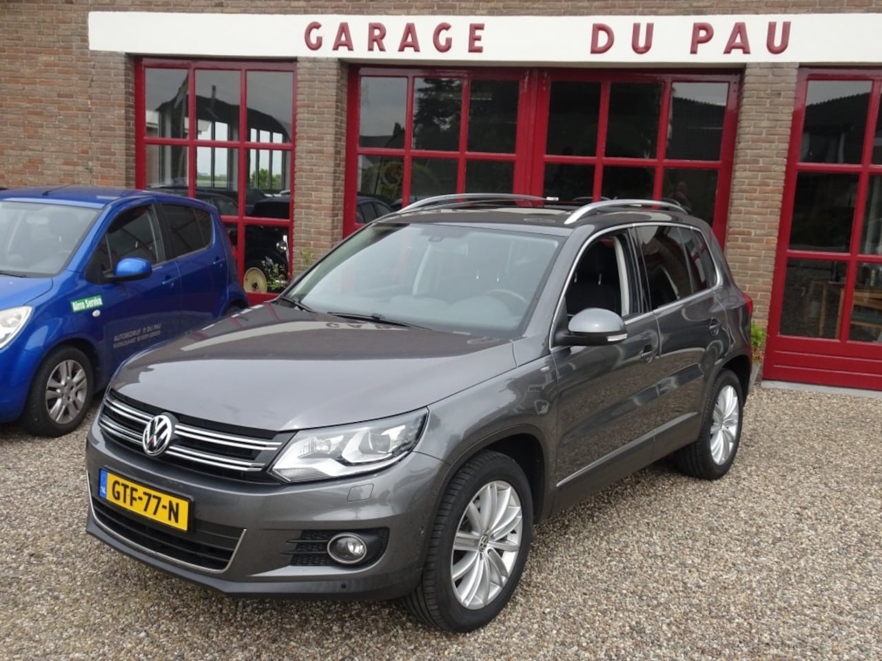 Volkswagen Tiguan - 2.0 TSi Aut.  Sport en Style Cup - AutoWereld.nl