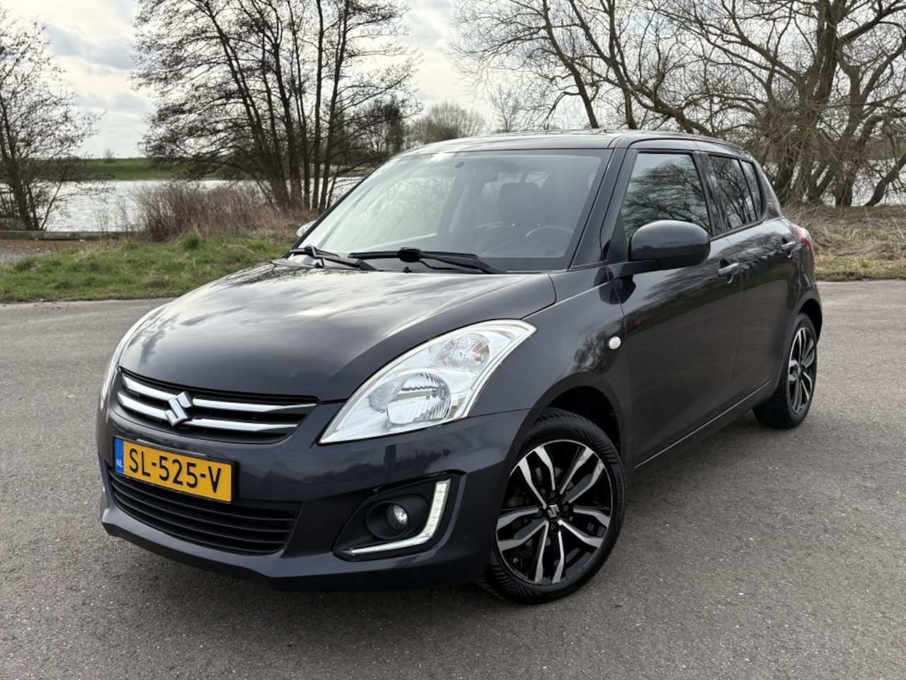 Suzuki Swift - 1.2 Exclusive EASSS Stoelverw Cruise Carplay Airco - AutoWereld.nl
