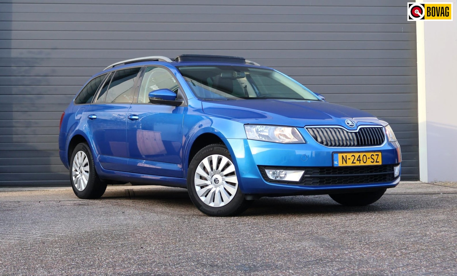 Skoda Octavia Combi - 1.6 TDI Elegance Businessline Pano/Navi/Clima/PDC - AutoWereld.nl