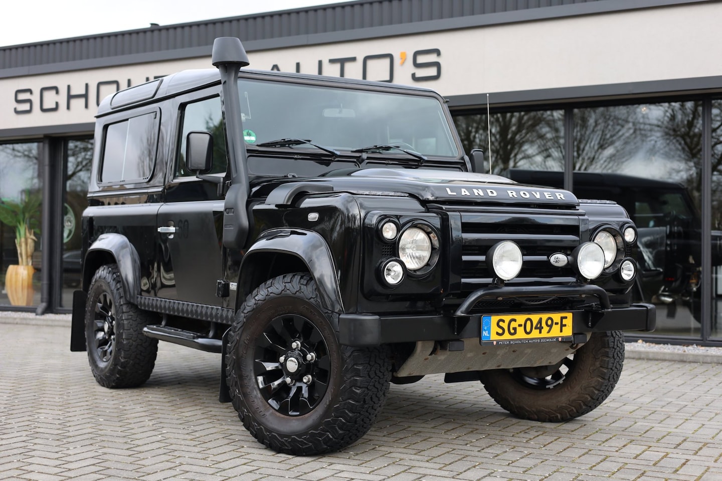 Land Rover Defender 90 - SW SVX 60th Anniversary 4-Persoons | Recaro Leder | Airco | LMV | - AutoWereld.nl