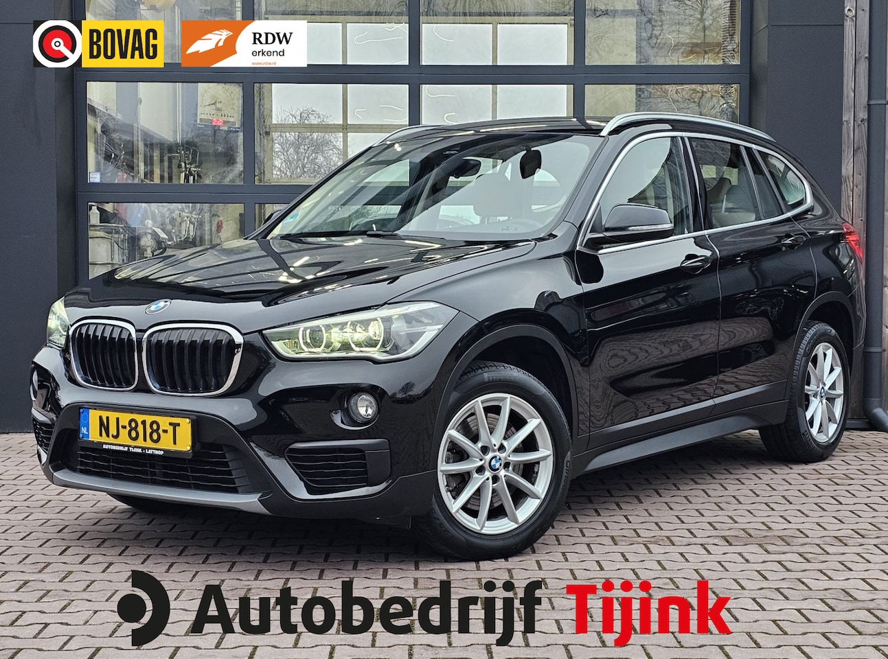 BMW X1 - sDrive20i Centennial High Executive | Automaat | Navi | Stoelverwarming | HUD | Parkeersen - AutoWereld.nl