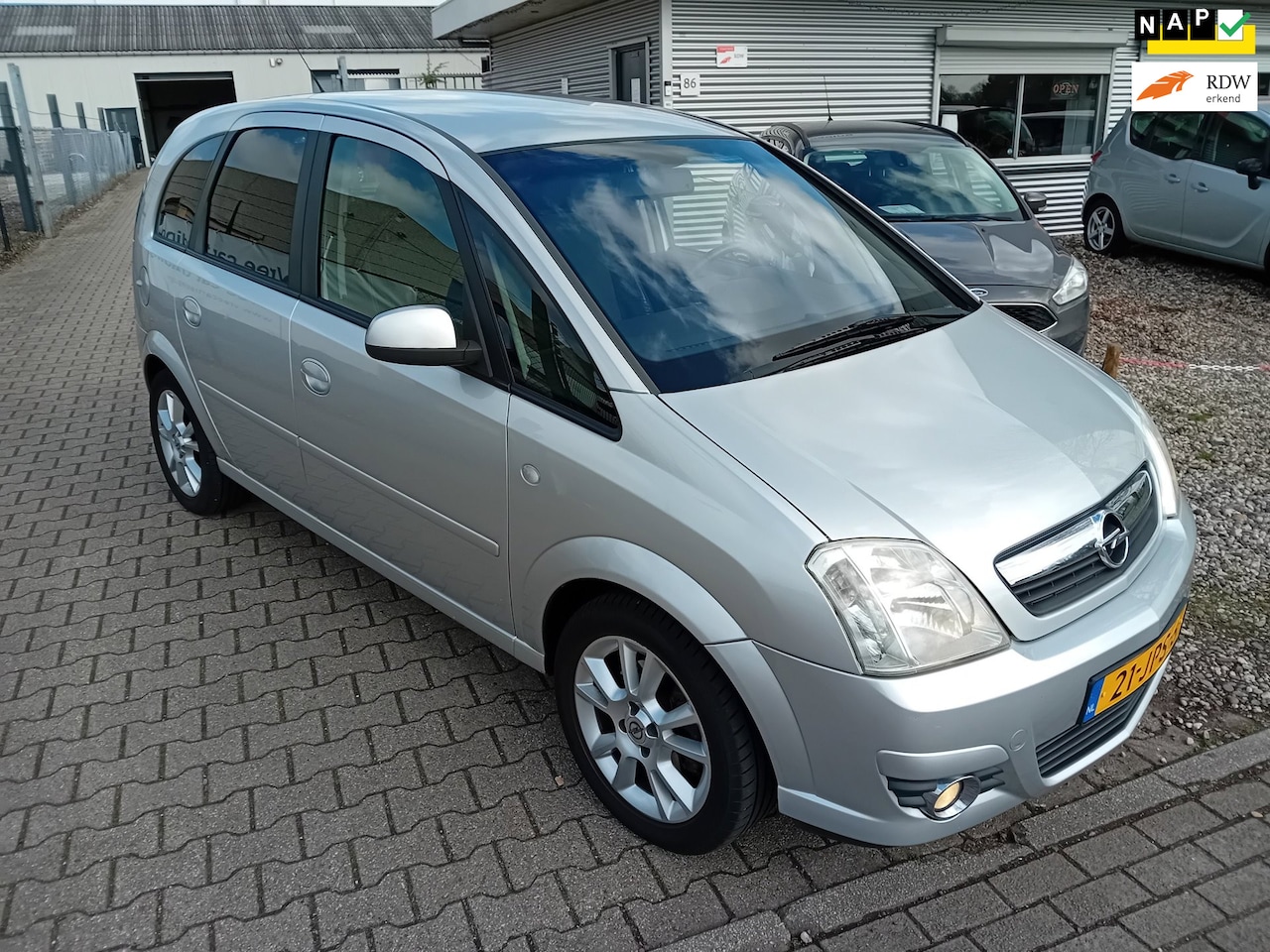 Opel Meriva - 1.6-16V Cosmo KEURIGE AUTO! 1E EIG. 136DKM!! - AutoWereld.nl