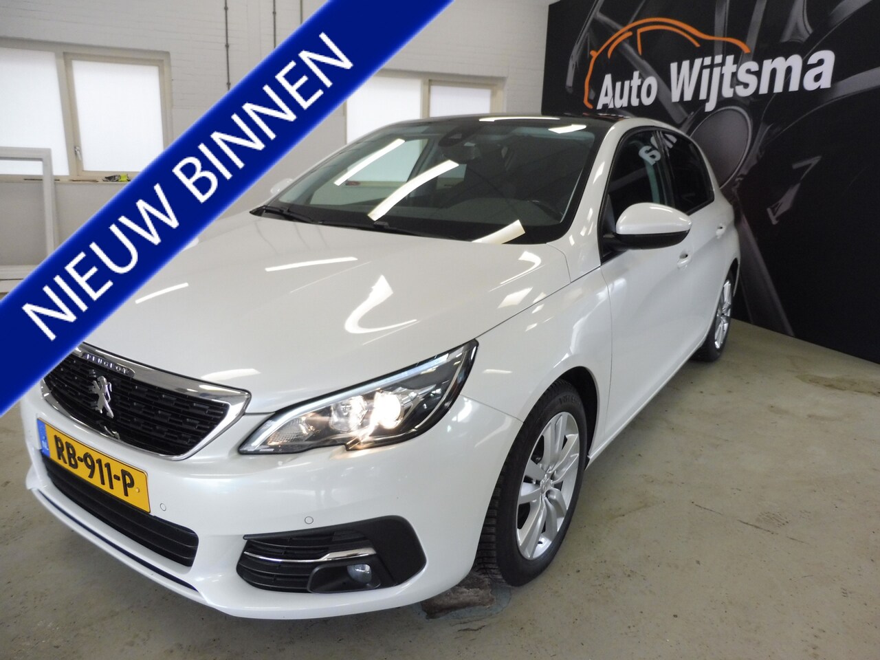 Peugeot 308 - 1.2 PureTech Blue Lease Executive Trekhaak | Pano | LMV | LED | Navi | Cruise - AutoWereld.nl