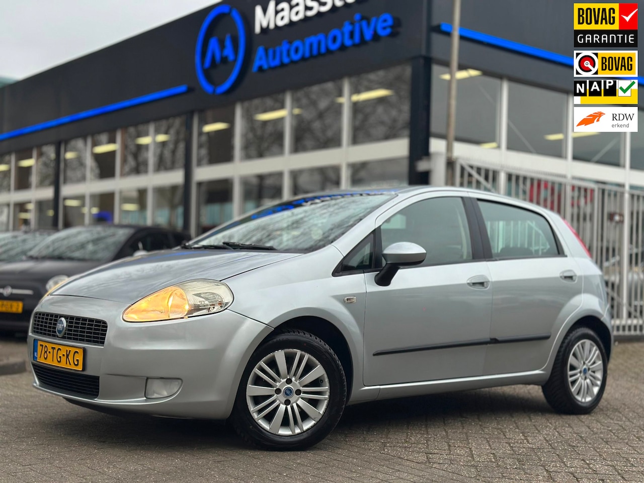 Fiat Grande Punto - 1.4 Edizione Blue & Me Cruise Airco 5drs - AutoWereld.nl