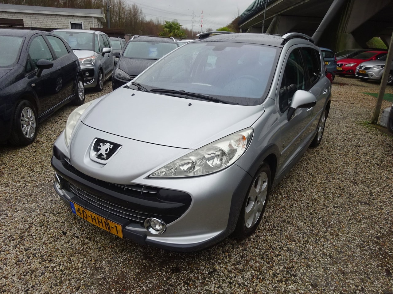 Peugeot 207 SW Outdoor - 1.6 VTi XS 1.6 VTi XS, Airco, Panoramadak, Trekhaak - AutoWereld.nl