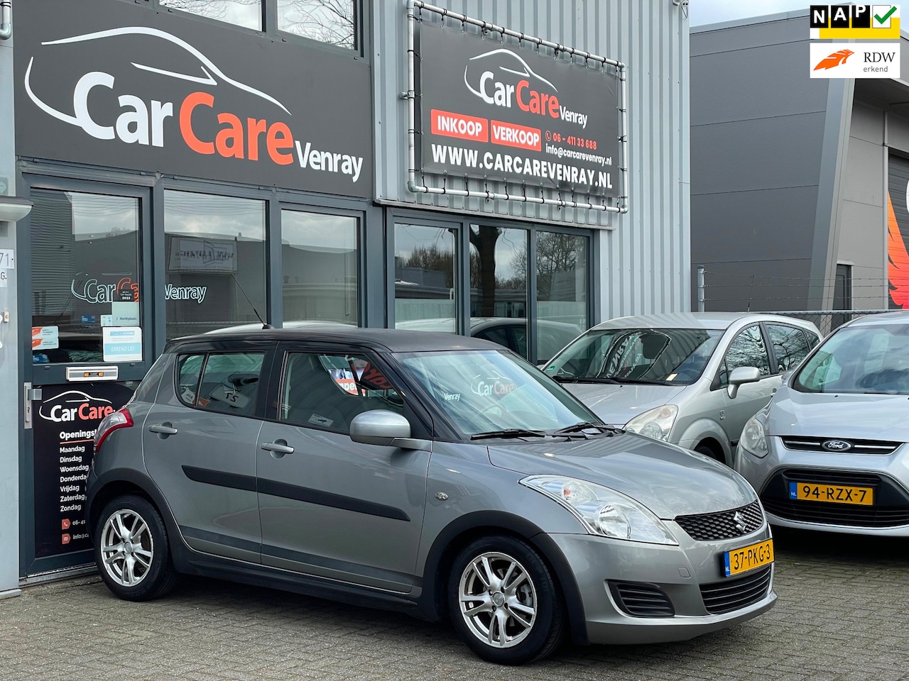 Suzuki Swift - 1.2 Comfort|APK11-2026|AUTOMAAT|AIRCO|NAP|STOELVERWARMING| - AutoWereld.nl