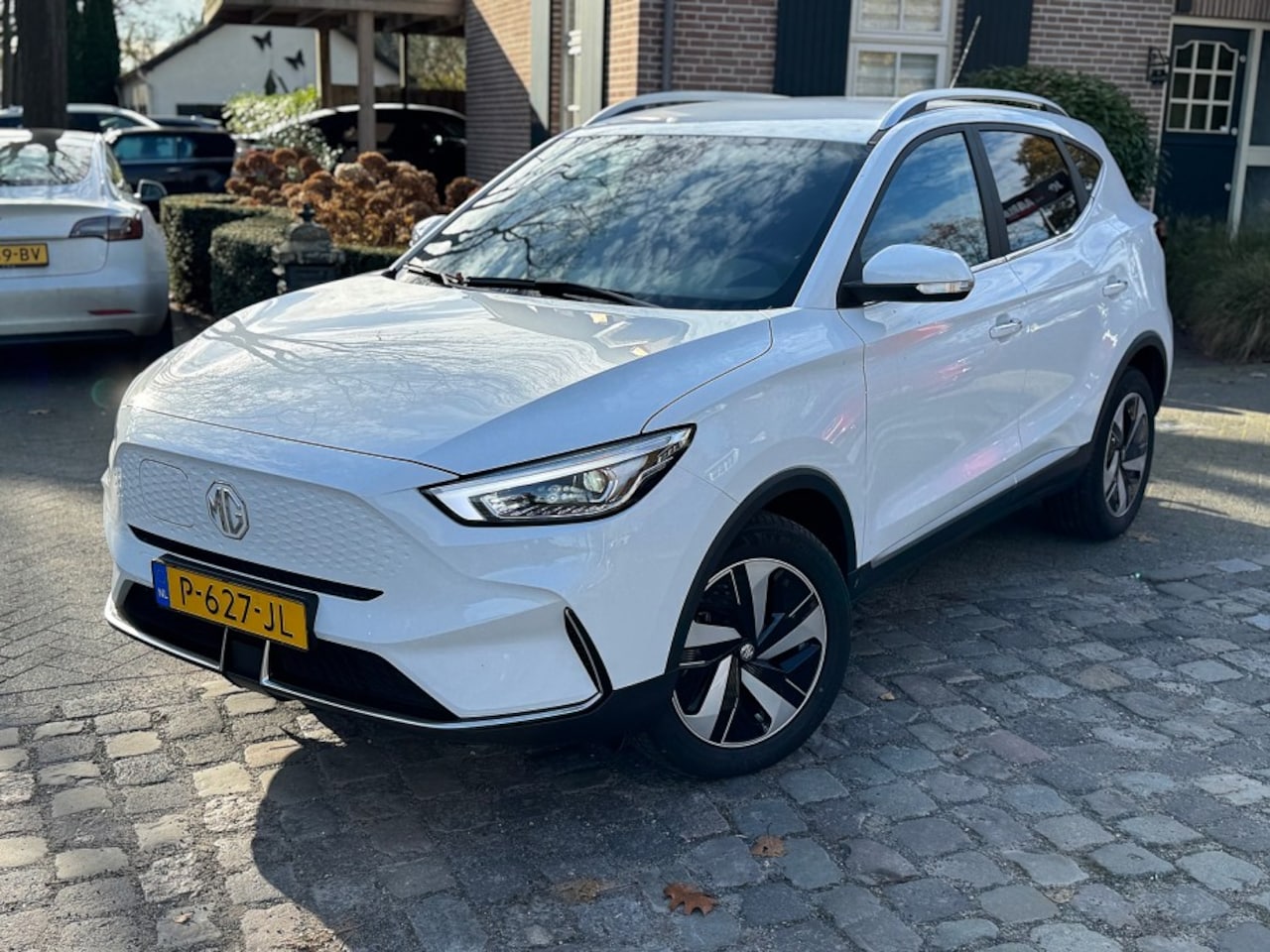 MG ZS - Comfort 50 kWh ecc,lmv,navi,trekhaak - AutoWereld.nl