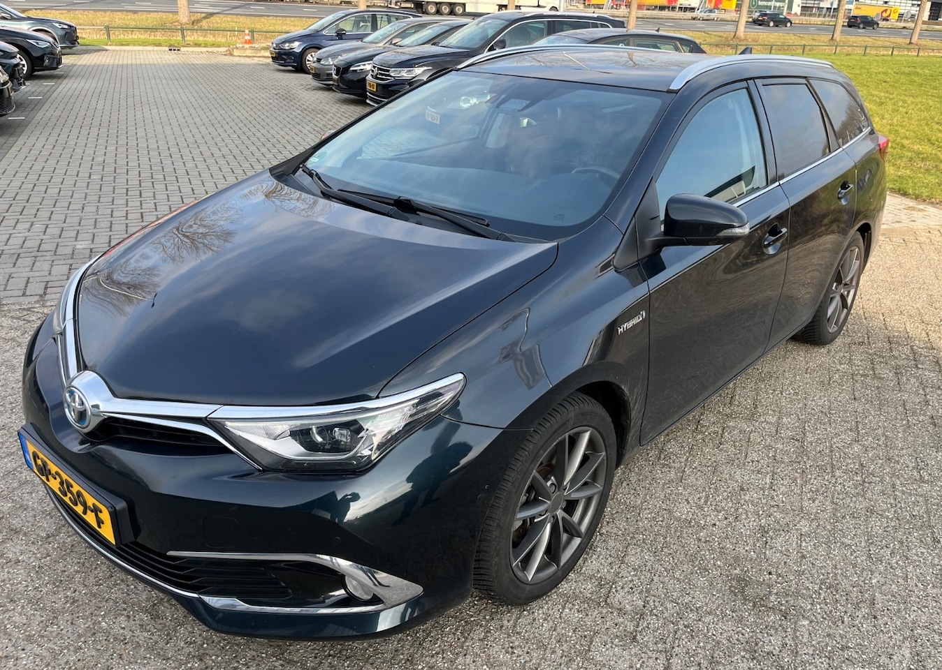 Toyota Auris Touring Sports - 1.8 Hybrid Lease Exclusive Pano Leer Navi - AutoWereld.nl