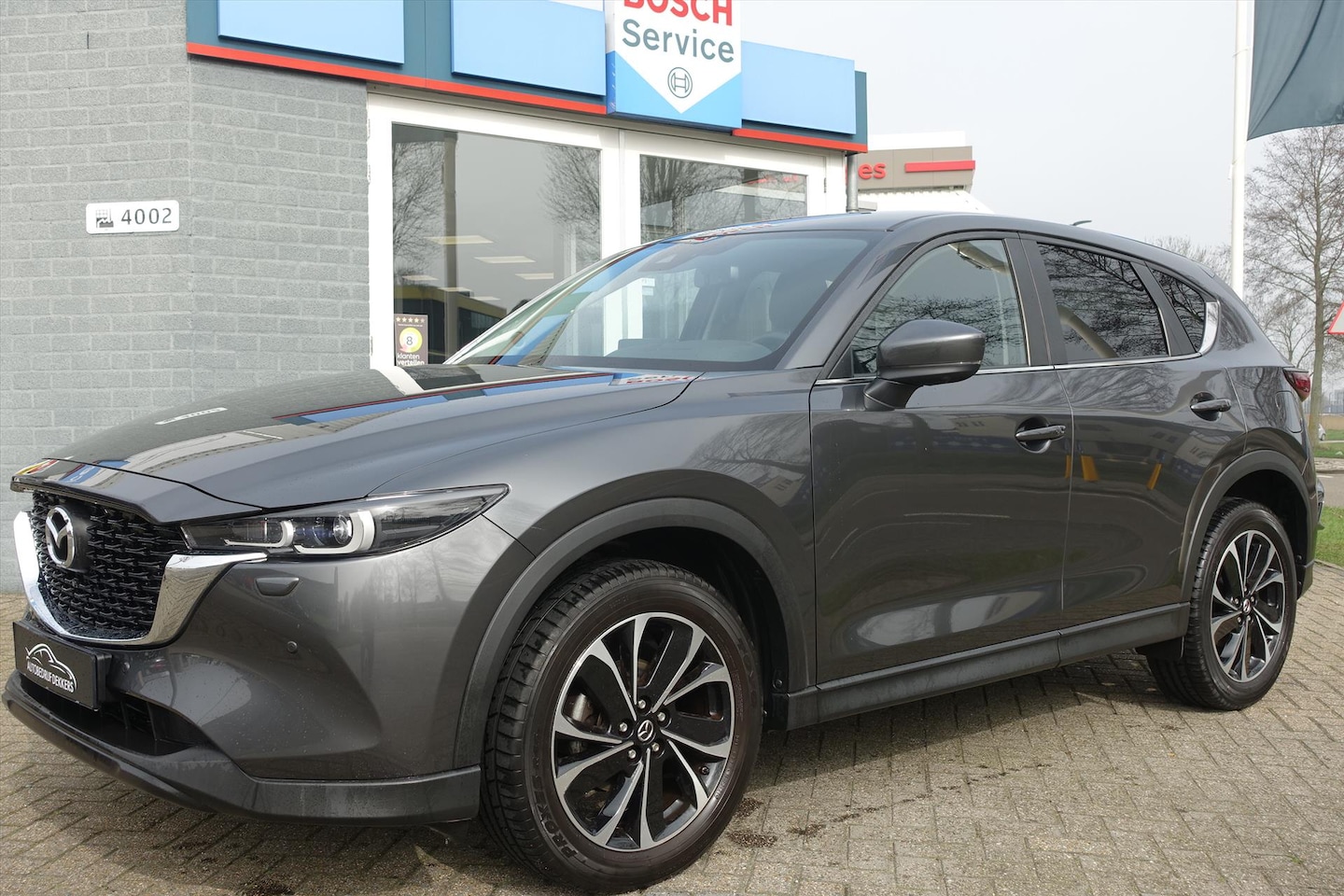 Mazda CX-5 - 2.0 SKYACTIV-G 165pk 2WD Comfort | HEAD UP | CARPLAY | TREKHAAK | 360CAM - AutoWereld.nl