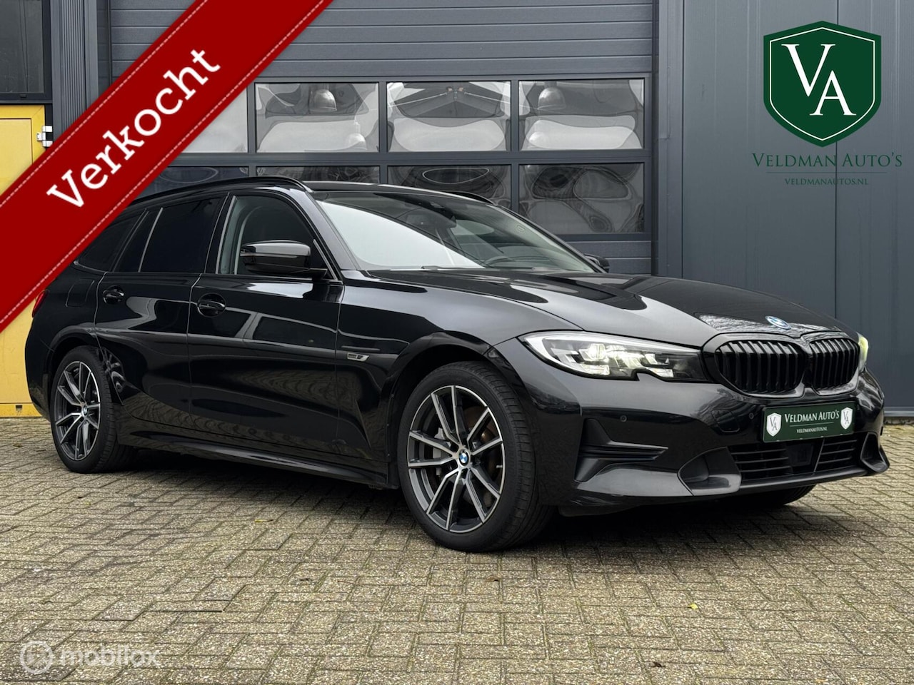 BMW 3-serie Touring - 330e Sport line | Black edition | - AutoWereld.nl