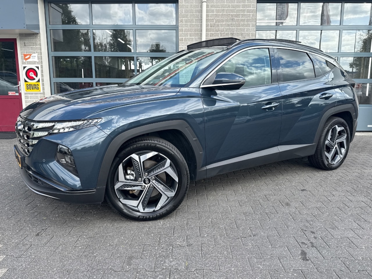 Hyundai Tucson - 1.6 T-GDI PHEV Comfort 4WD | SCHUIFDAK | CAMERA | - AutoWereld.nl