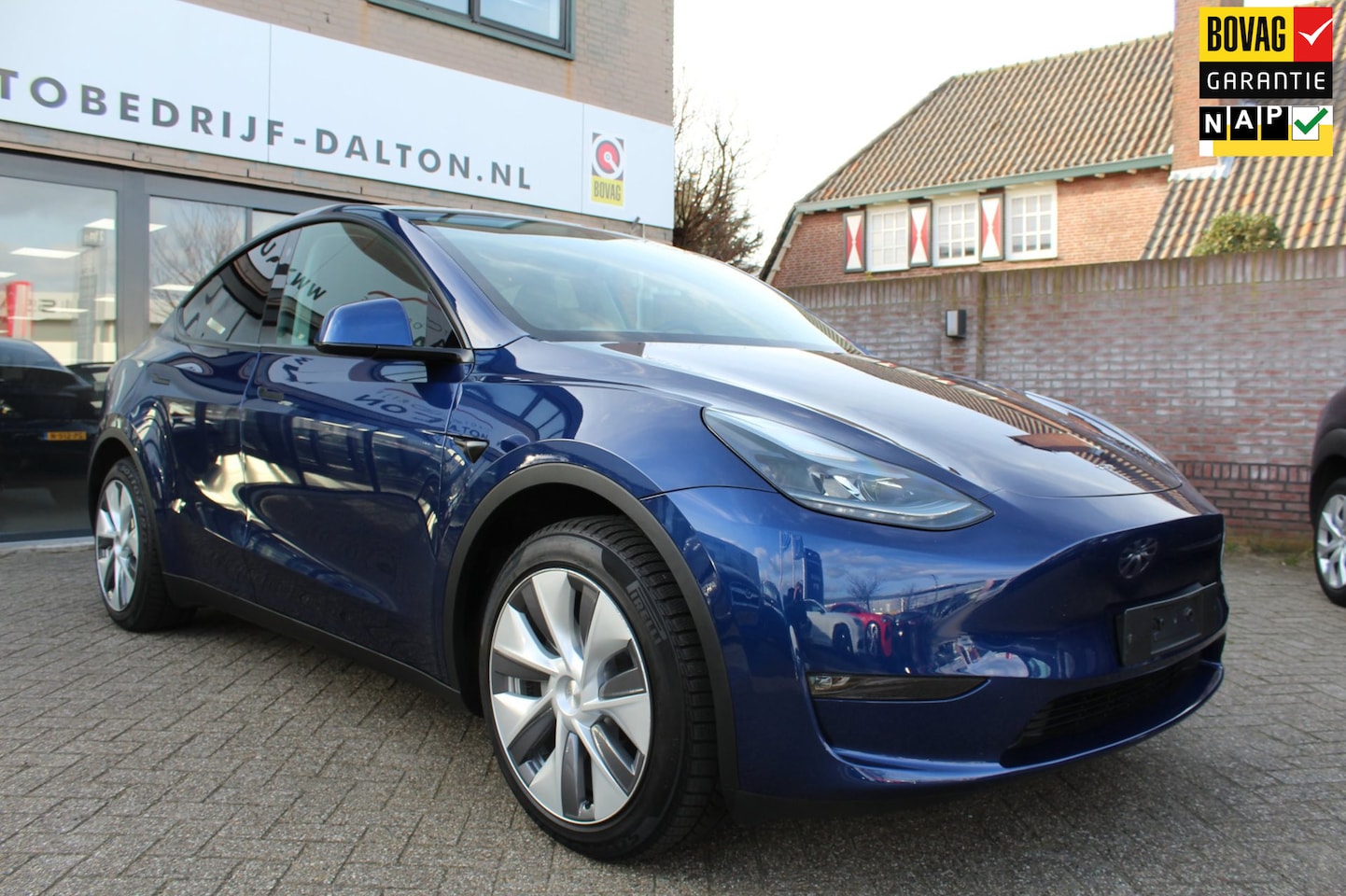 Tesla Model Y - Long Range AWD 75 kWh TREKHAAK / 1e EIG. / LAGE KM / NIEUWSTAAT - AutoWereld.nl