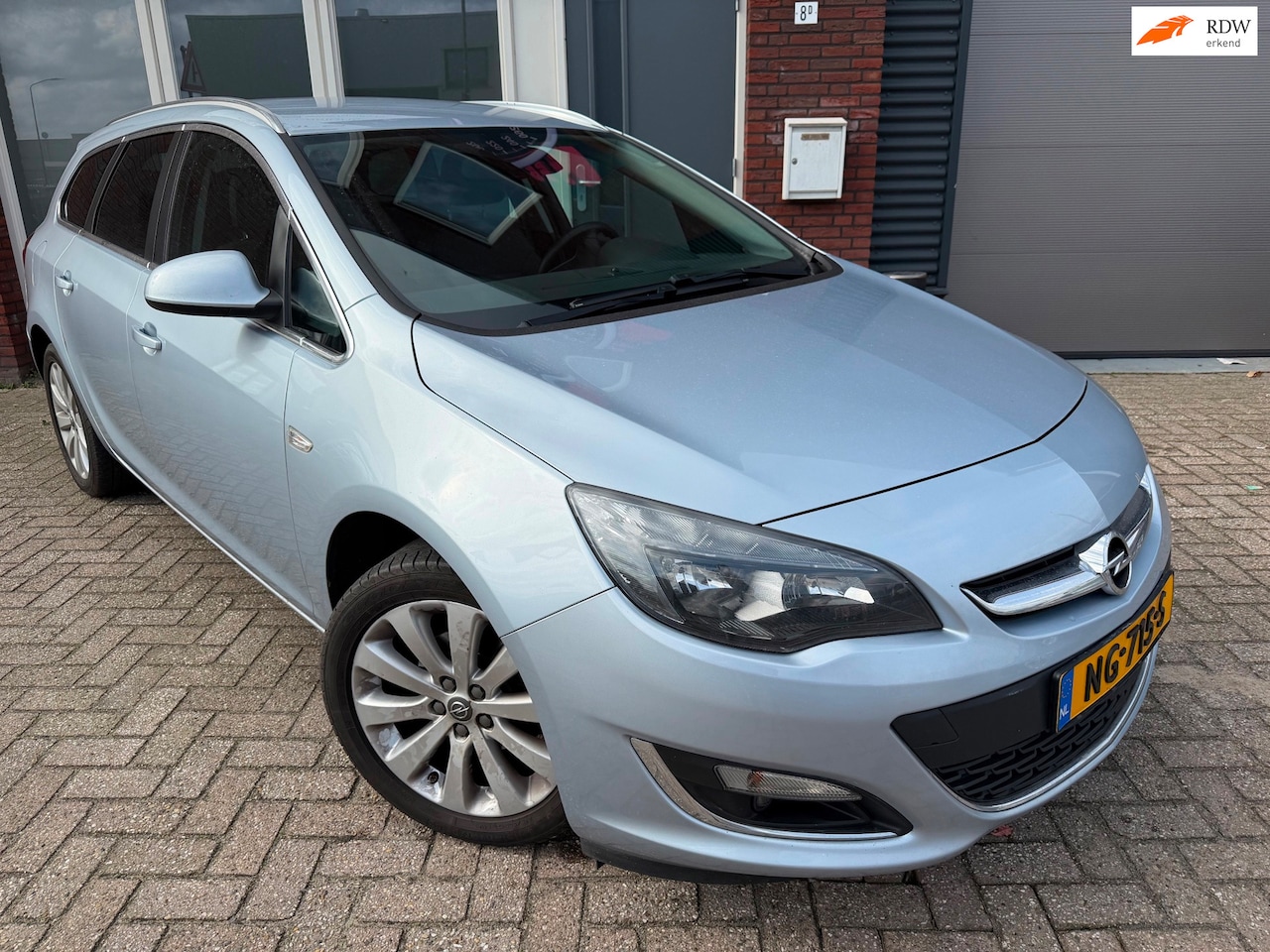 Opel Astra Sports Tourer - 1.4 Business + / Leder / Navi / PDC / Cruise / Airco - AutoWereld.nl