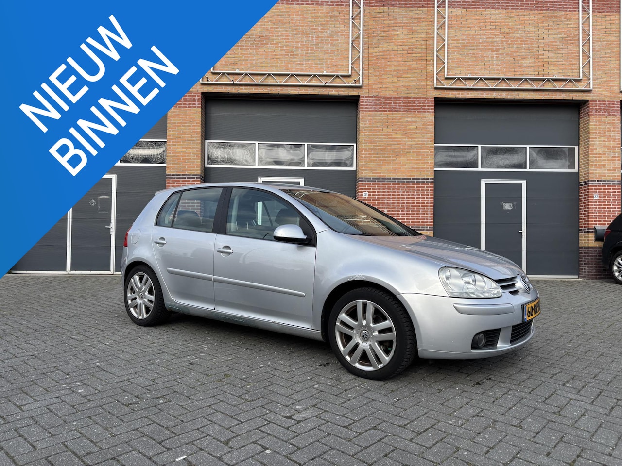 Volkswagen Golf - 1.6 FSI Sportline 1.6 FSI Sportline - AutoWereld.nl
