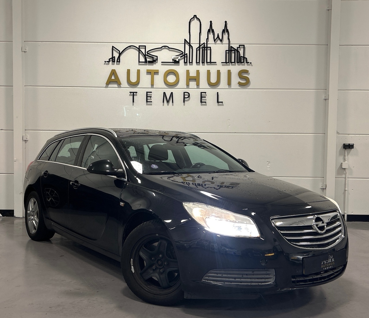 Opel Insignia Sports Tourer - 1.6 T Edition Nap Airco Trekhaak Pdc Cruise Climate Navi - AutoWereld.nl