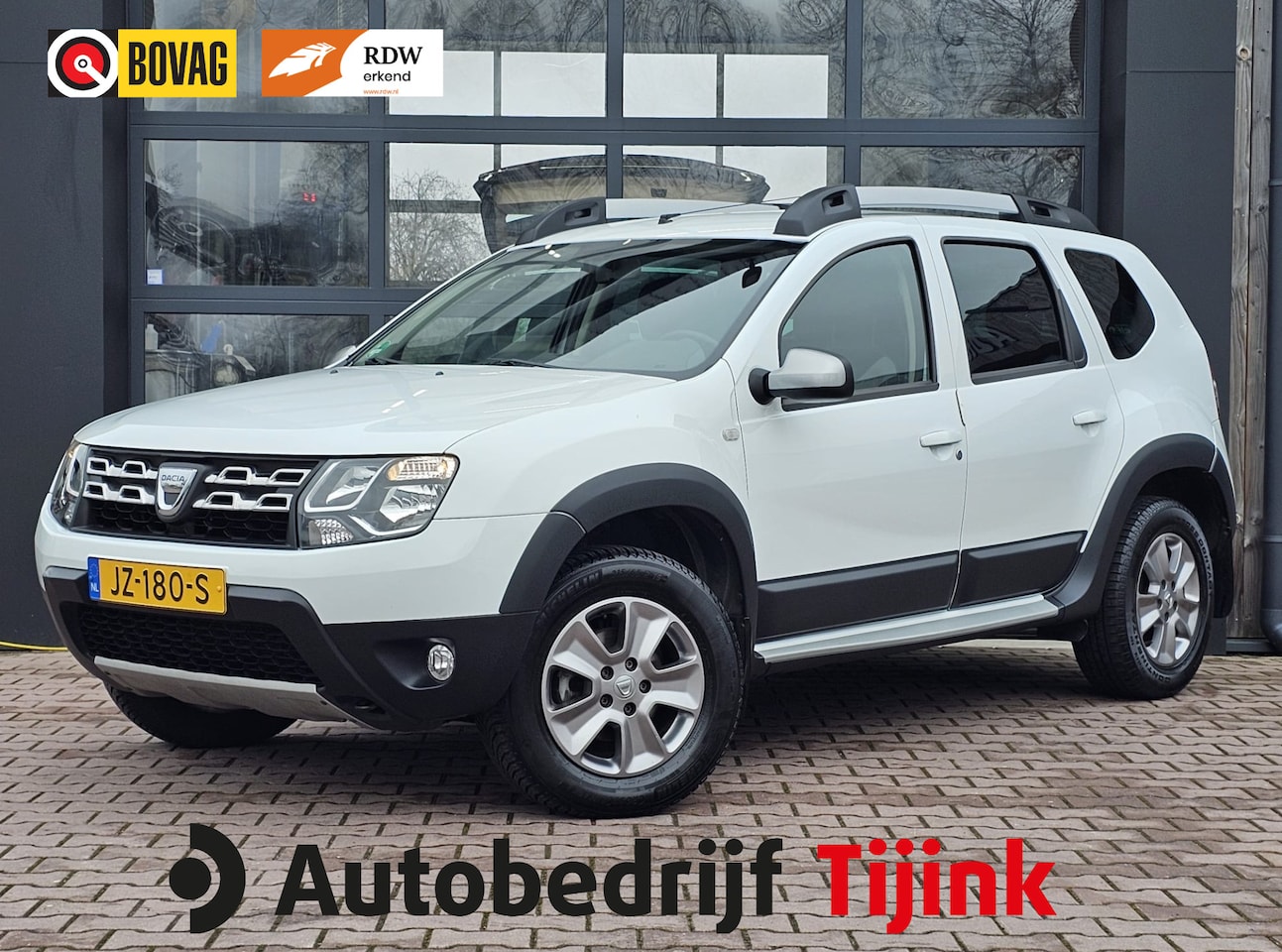 Dacia Duster - 1.2 TCe 4x2 Lauréate | Airco | Cruise | Trekhaak | All-seasons | PDC | - AutoWereld.nl