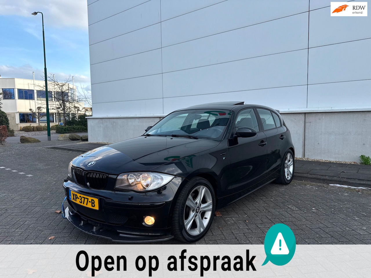 BMW 1-serie - 118i DAK/NAVI/CLIMA/5 DRS/STLVRWMNG/NWE APK - AutoWereld.nl