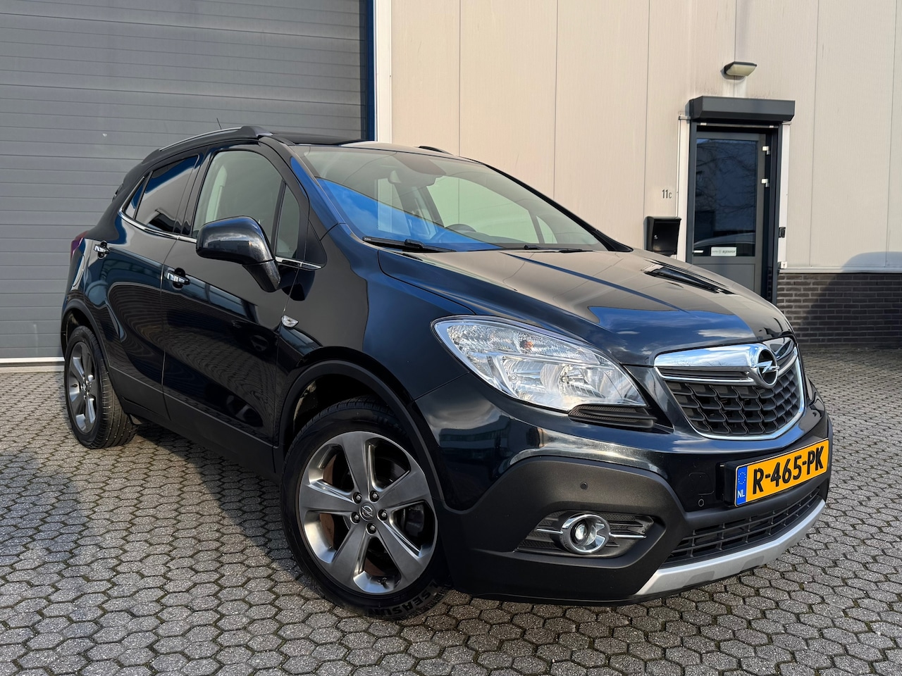 Opel Mokka - 1.4 T Cosmo | Automaat | Schuifdak | AGR stoelen | Leer | Navi | ECC | Camera | Parkeersen - AutoWereld.nl