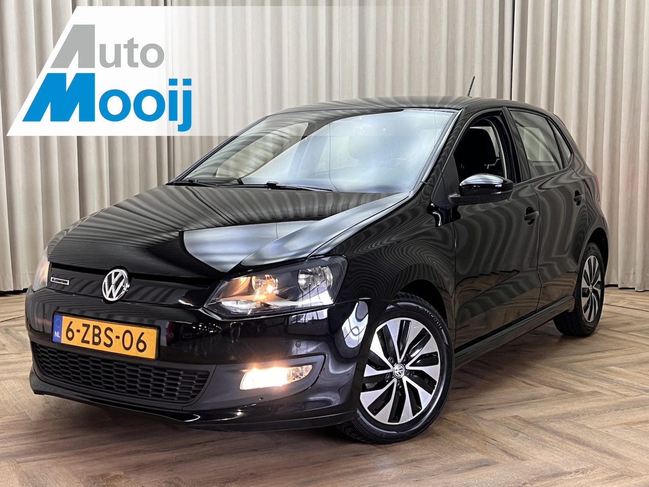 Volkswagen Polo - 1.4 TDI BlueMotion Navigatie / Cruise Control /  Airco / PDC / Org.NL! / 15"LMV - AutoWereld.nl