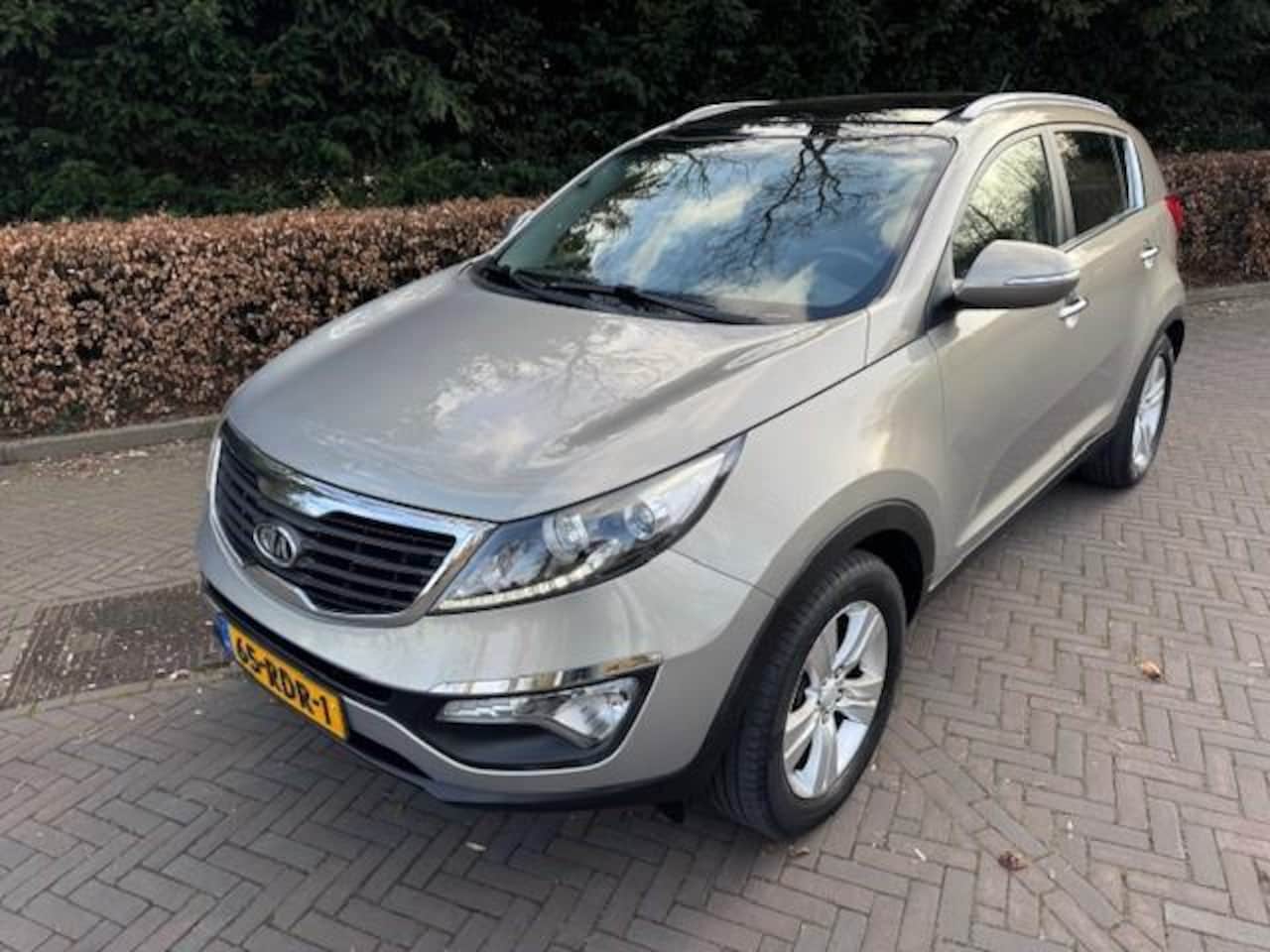 Kia Sportage - 1.6GDI X-ecutive + 135pk/Trekhaak/Pano/Navi/Hleer/APK - AutoWereld.nl