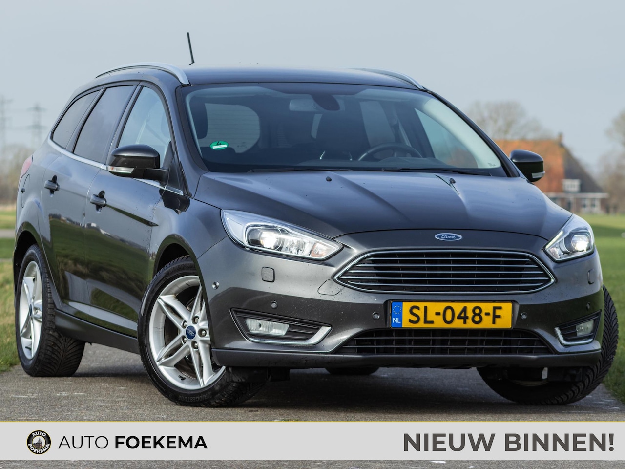 Ford Focus Wagon - 1.0 Titanium LED Camera PDC - AutoWereld.nl