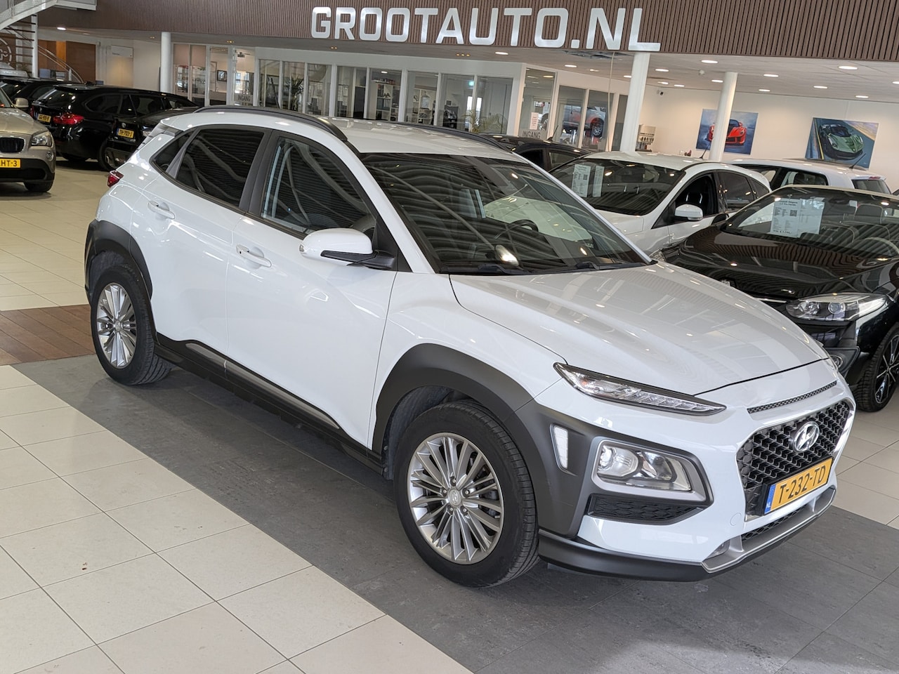 Hyundai Kona - 1.0T Premium Airco, Cruise Control, Stuurbekrachtiging - AutoWereld.nl