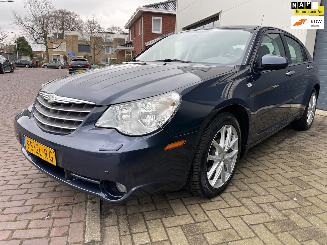 Chrysler Sebring - 2.7 /1eigenaar/Automaat/Leder/Stoelverwarming/PDC/Climate-c/Cruise-c - AutoWereld.nl