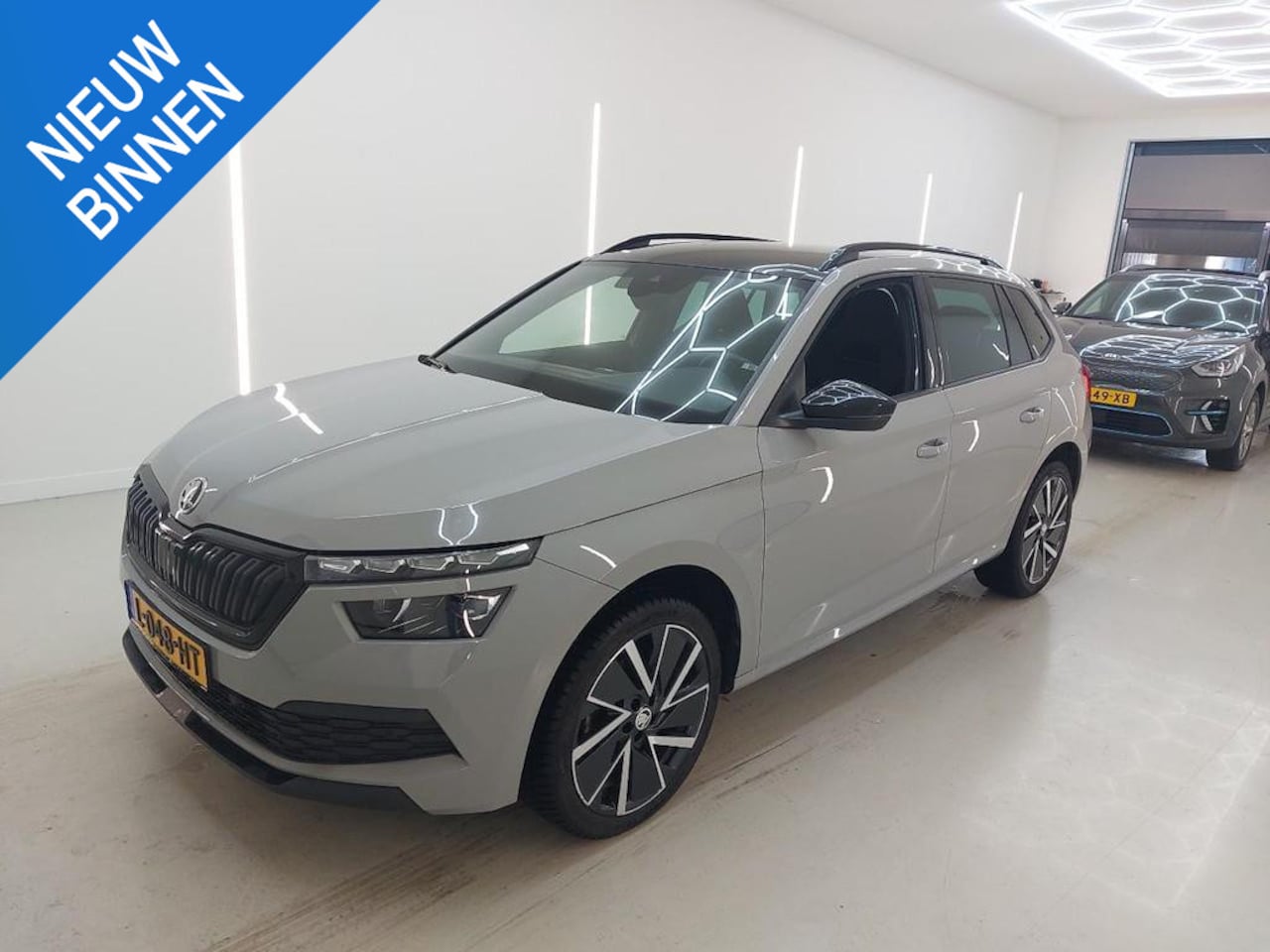 Skoda Kamiq - 1.0 TSI SPORT BUSINESS I AUTOMAAT I PANORAMADAK I TREKHAAK I APPLE CARPLAY - AutoWereld.nl