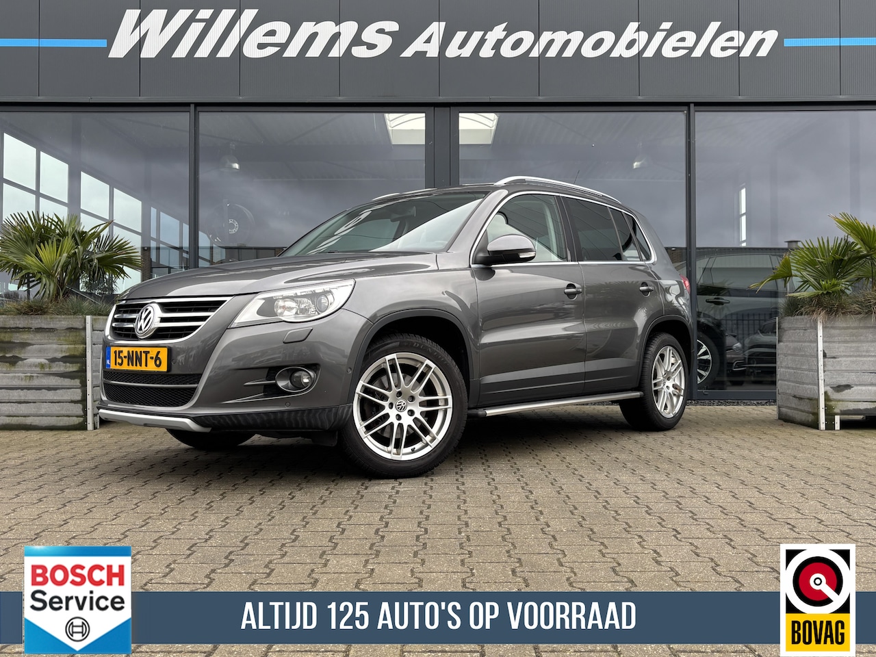 Volkswagen Tiguan - 1.4 TSI Sport&Style Stoelverwarming, Panorama Dak & Cruise Control - AutoWereld.nl