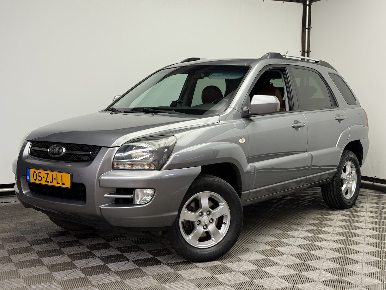 Kia Sportage - 2.0 CVVT X-ception ECC Cruise Leer Trekhaak NL Auto - AutoWereld.nl
