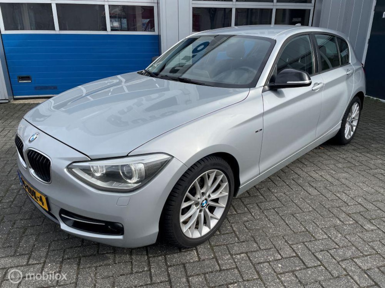 BMW 1-serie - 116i Business Urban Line Nw ketting + kleprubber - AutoWereld.nl
