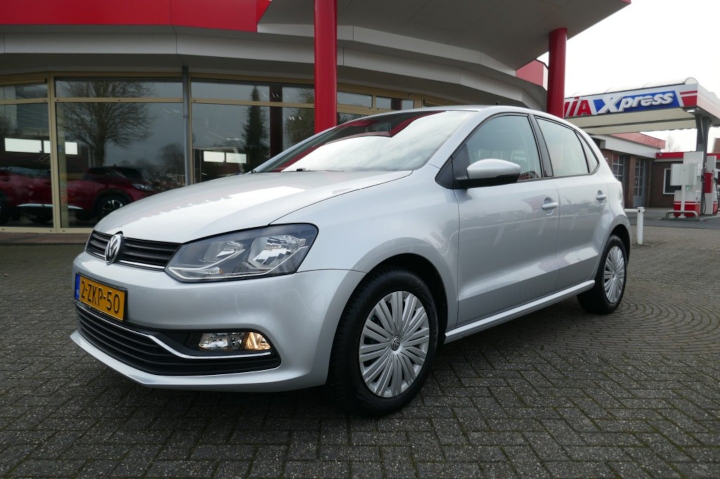 Volkswagen Polo - 1.2 TSI COMFORTLINE  NAVIGATIE/AIRCO/TREKHAAK - AutoWereld.nl