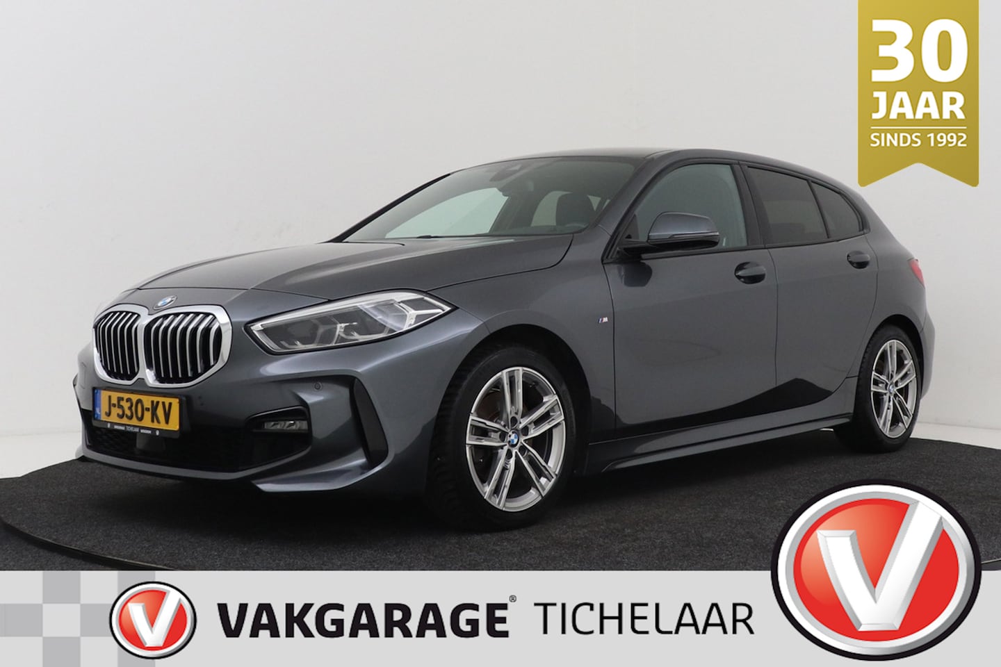 BMW 1-serie - 118i High Executive M-Sport | Trekhaak | CarPlay | Dealer Ond. | Stoelverwarming | Cruise - AutoWereld.nl