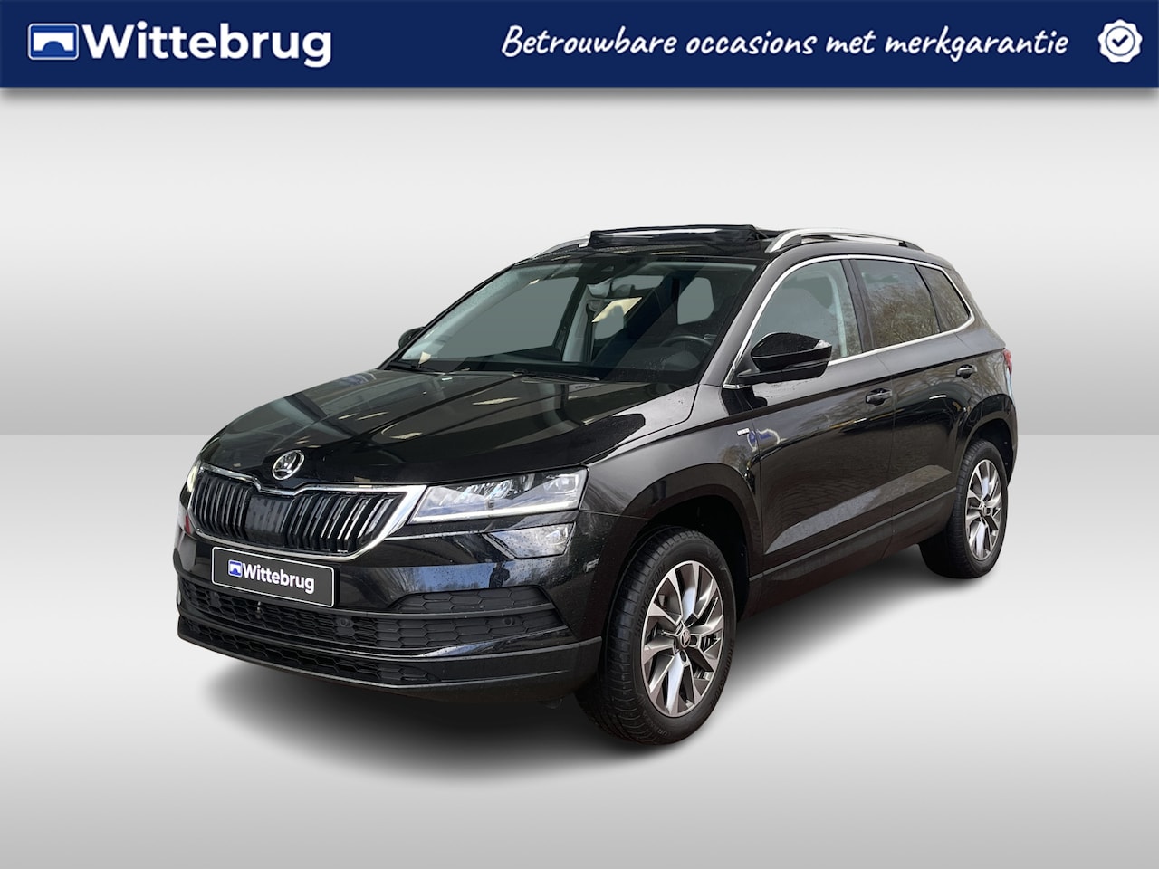 Skoda Karoq - 1.5 TSI 150pk DSG Ambition clever / Panoramadak / Achteruitrij camera / Led verlichting / - AutoWereld.nl