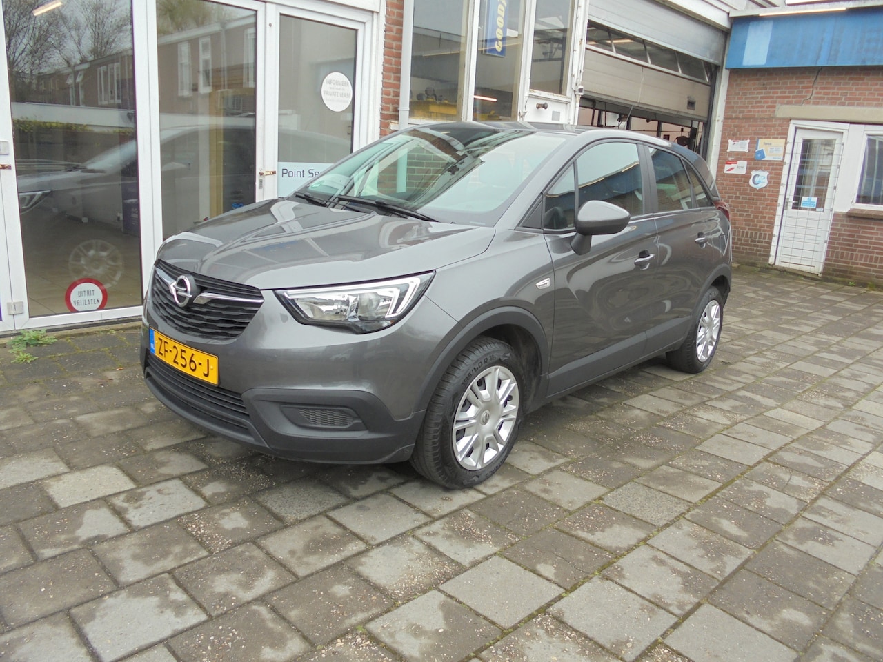 Opel Crossland X - 1.2 Turbo Edition Airconditioning, Navigatie, Parkeer Sensoren achter, - AutoWereld.nl