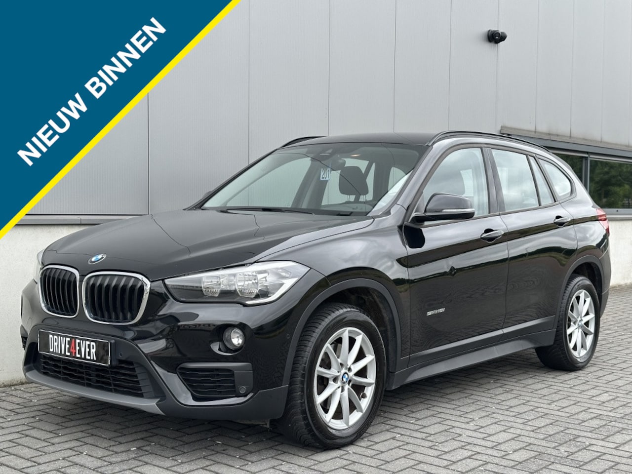 BMW X1 - sDrive18i NAVI CLIMATE PDC SPORTVELGEN ELEK PAKKET - AutoWereld.nl