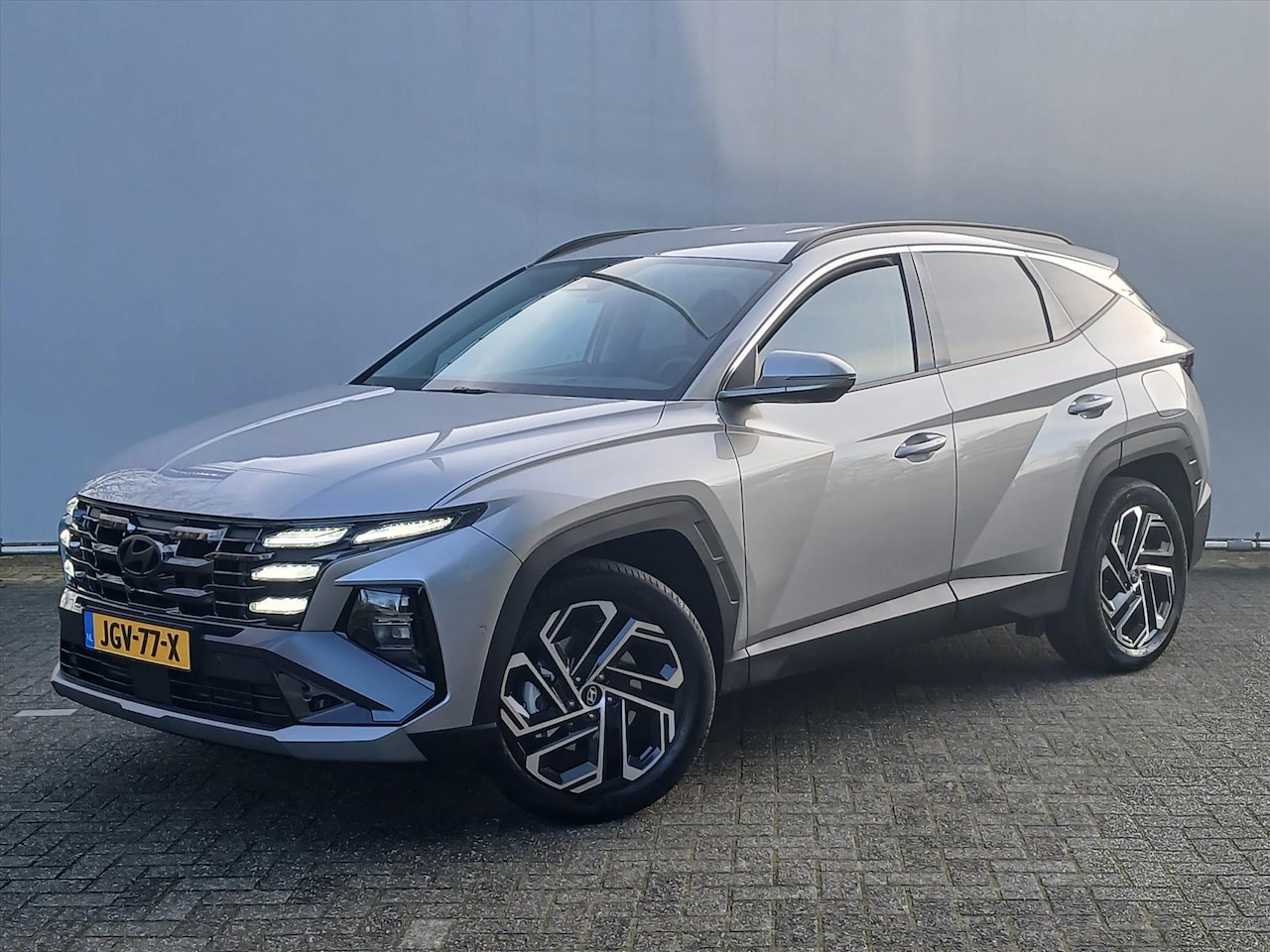 Hyundai Tucson - 1.6 T-GDi HEV 238pk 2WD Aut Premium | Navi | Cruise en Climate Control - AutoWereld.nl