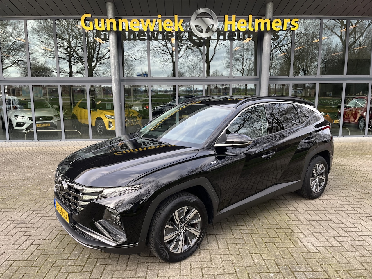 Hyundai Tucson - 1.6 T-GDI MHEV Comfort Smart | AUTOMAAT | CAM | CARPLAY | LANE ASIST | NAVI | PDC V&A | ST - AutoWereld.nl