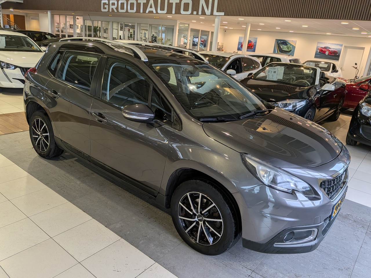 Peugeot 2008 - 1.2 PureTech Blue Lion Panoramadak, Airco, Stuurbekrachtiging - AutoWereld.nl