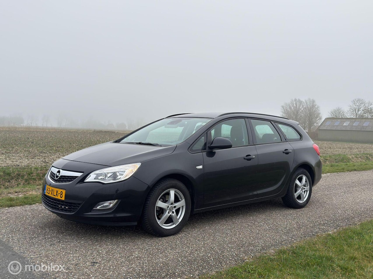Opel Astra Sports Tourer - 1.4 Turbo Business + Trekhaak luxe - AutoWereld.nl