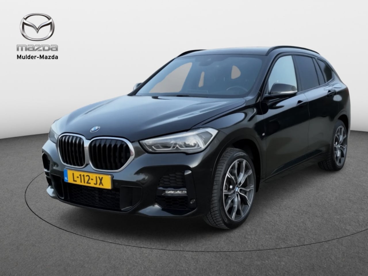 BMW X1 - sDrive20i High Executive M-pakket | Panoramadak | Leder - AutoWereld.nl